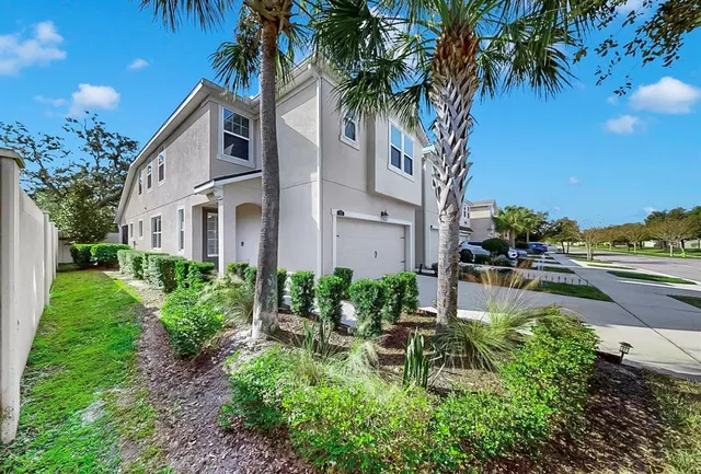 front view of a house with a small yard