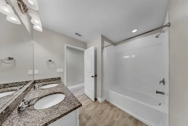 a view of room that has a walk in closet