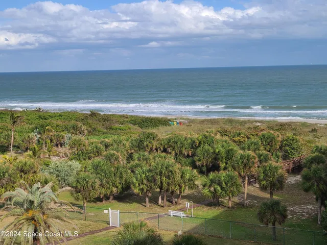 a view of a room with lots of green space