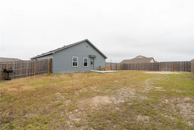 a house view with a garden space