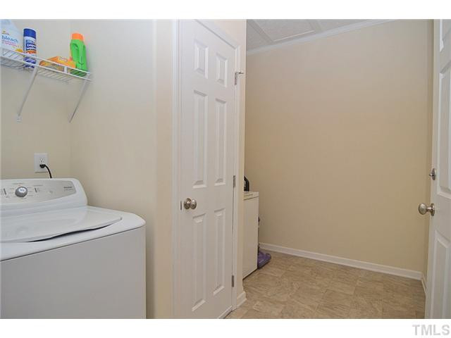 7300 Matthews Road Durham, NC 27712 - Photo 18 of 22 Generous Laundry/Mudroom with Exit to the Back Yard. Laundry Room