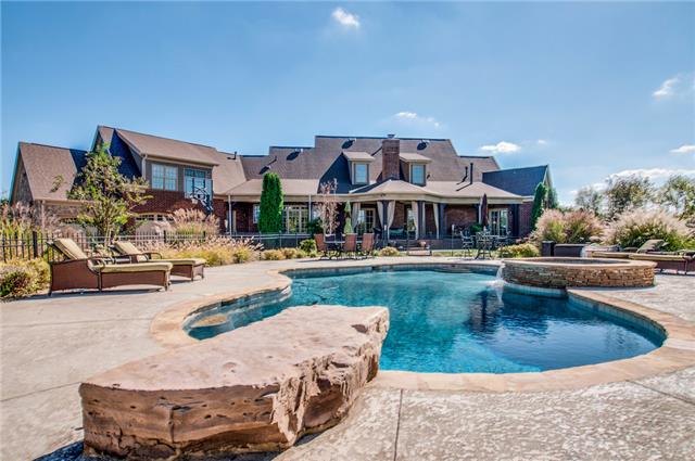 4219 Two Rivers Lane Franklin, TN 37069 - Photo 18 of 20 a view of a swimming pool with outdoor seating