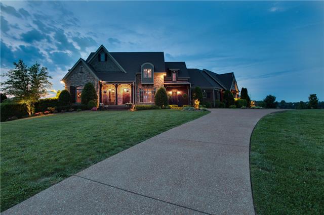 4219 Two Rivers Lane Franklin, TN 37069 - Photo 20 of 20 a front view of a house with a yard