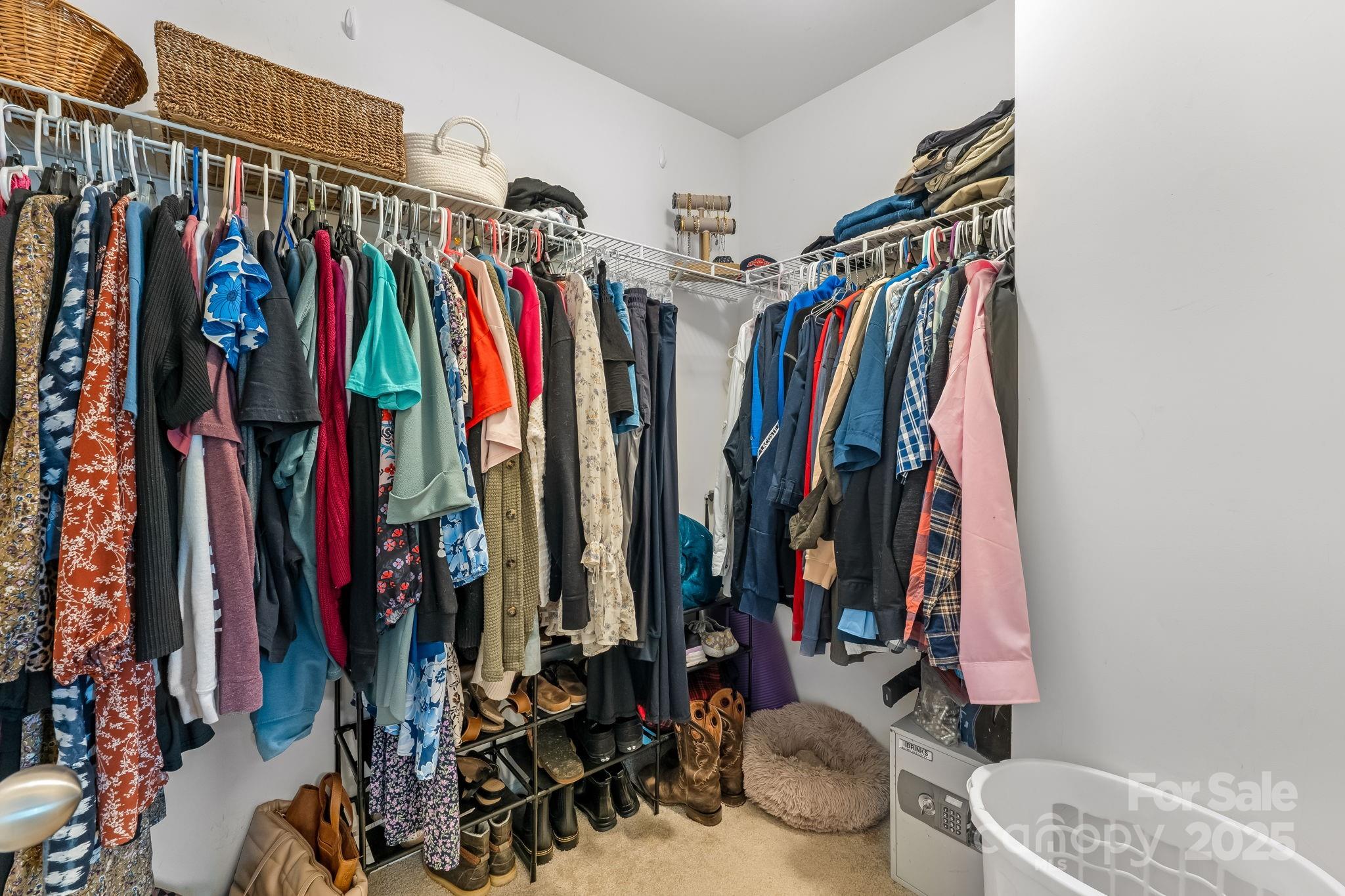 4246 Lotts Place Rock Hill, SC 29732 - Photo 14 of 24 a view of walk in closet with clothes