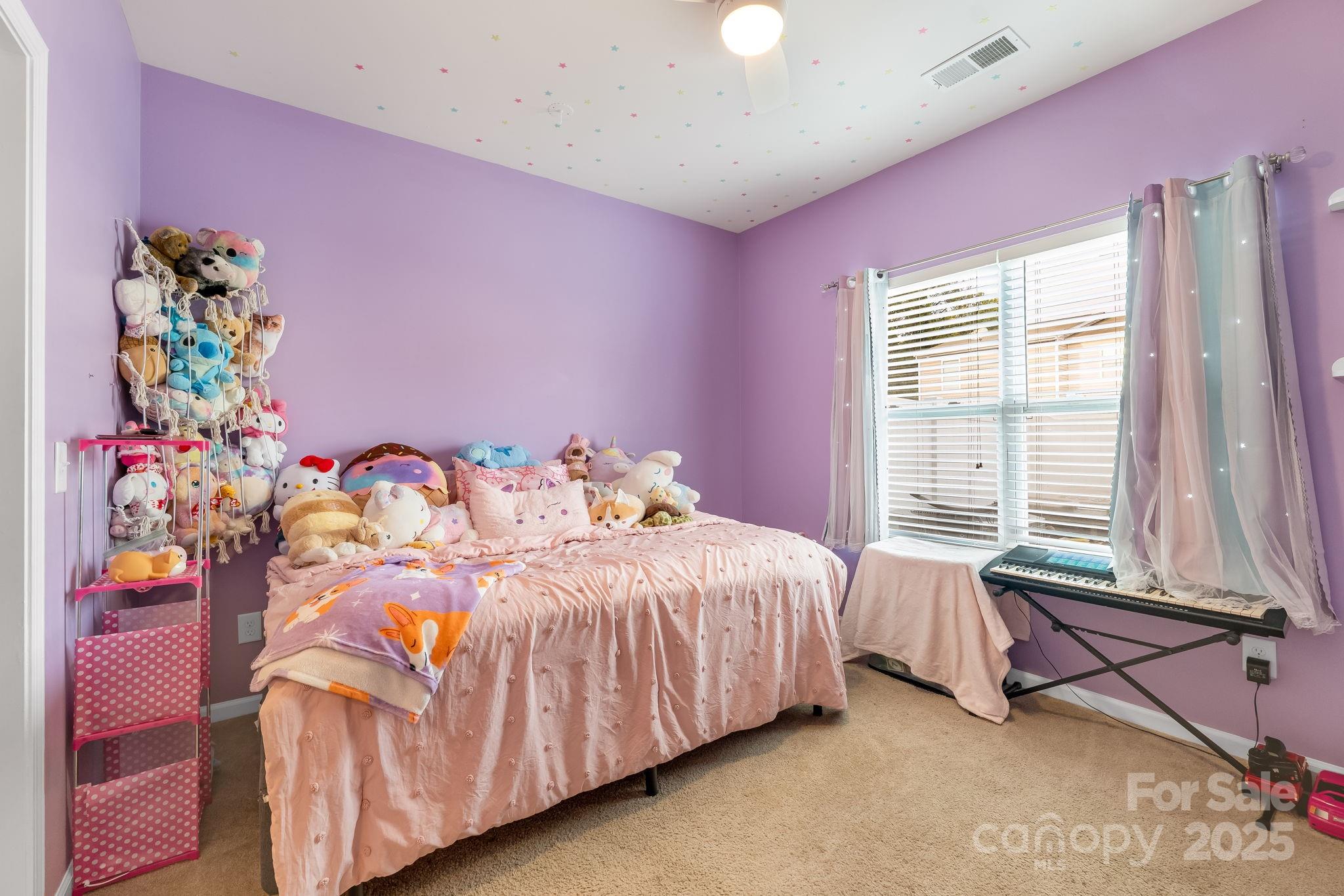 4246 Lotts Place Rock Hill, SC 29732 - Photo 16 of 24 a bedroom with a bed and a window