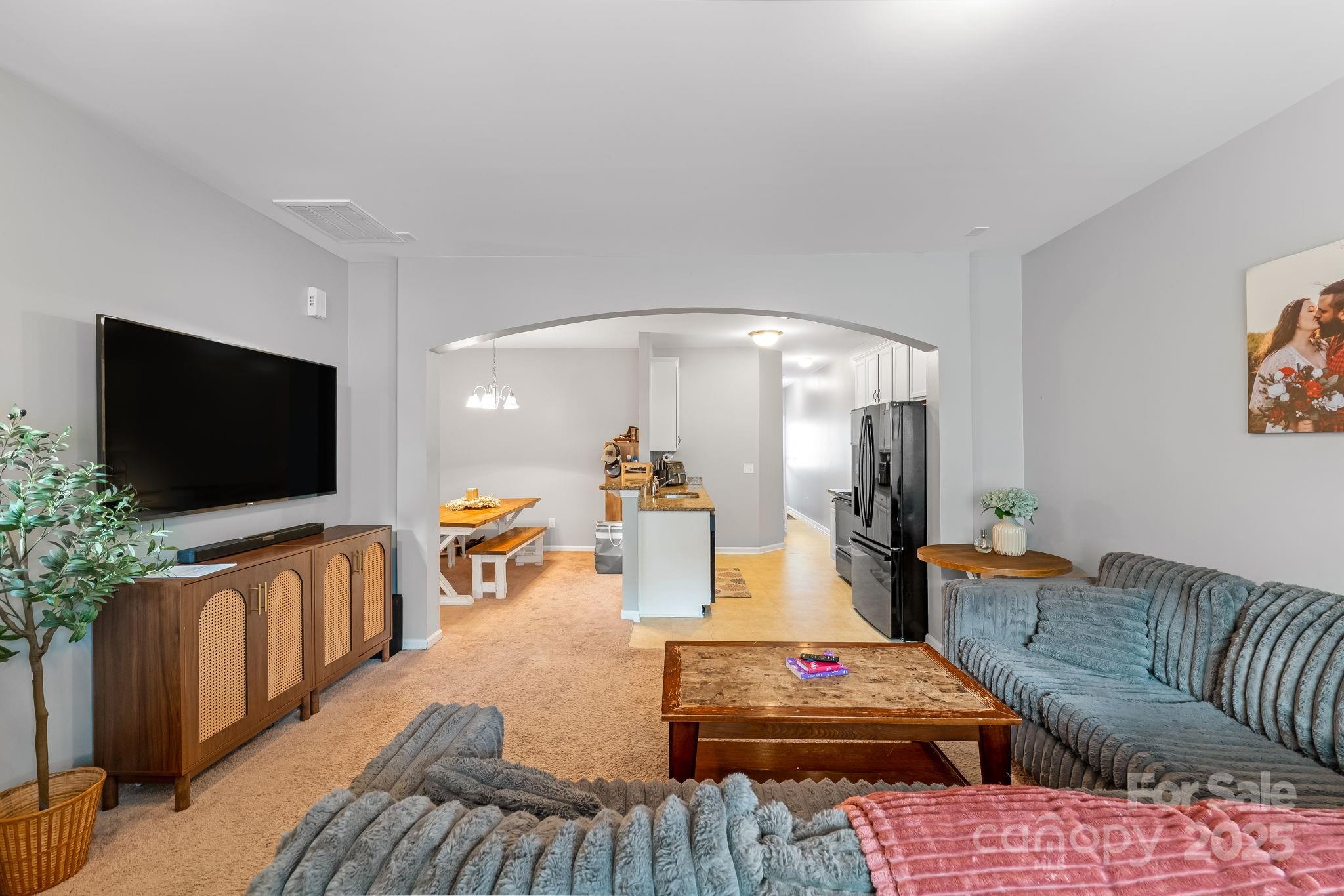 4246 Lotts Place Rock Hill, SC 29732 - Photo 3 of 24 a living room with furniture and a flat screen tv
