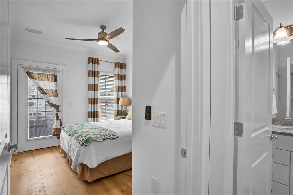 19915 Gulf Boulevard, Unit 204 Indian Rocks Beach, FL 33785 - Photo 33 of 47 a bedroom with a bed and a window