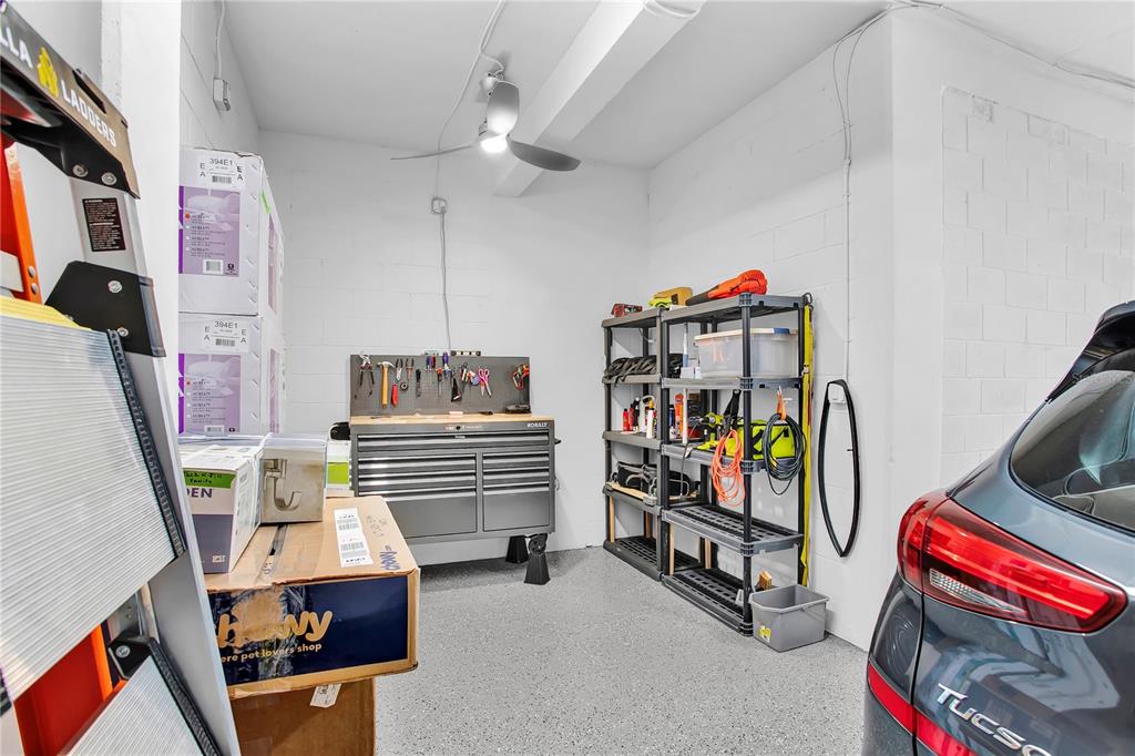 19915 Gulf Boulevard, Unit 204 Indian Rocks Beach, FL 33785 - Photo 42 of 47 a bedroom with furniture and a baby crib