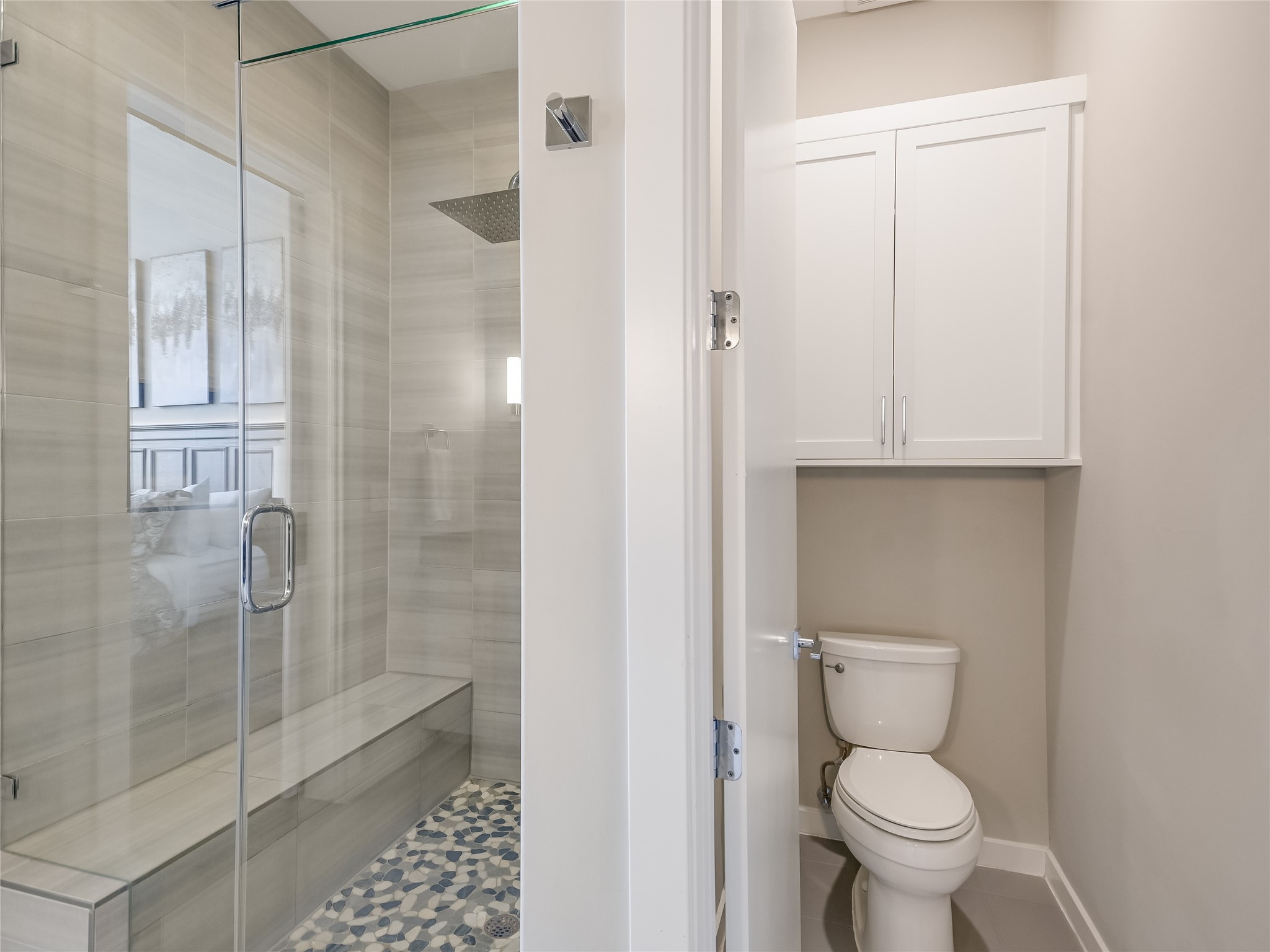 5921 Hiline Road, Unit 1501 Austin, TX 78734 - Photo 16 of 38 a bathroom with a toilet and a shower