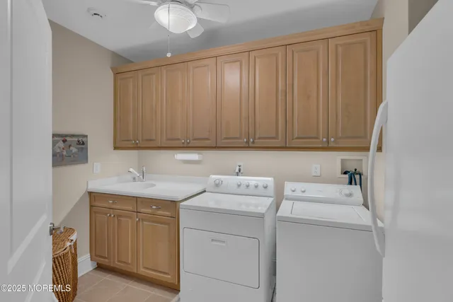 a view of a terrace with wooden floor and a ocean view