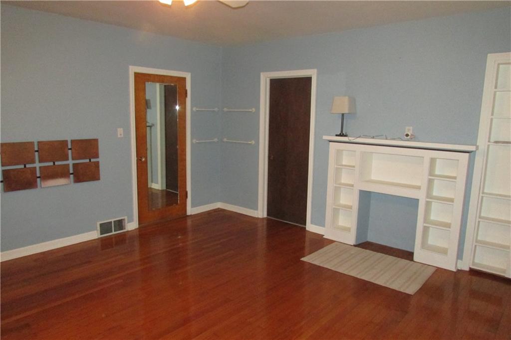 3110 Mercer Road New Castle, PA 16105 - Photo 12 of 25 Master bedroom with sitting area and entry to the bathroom.