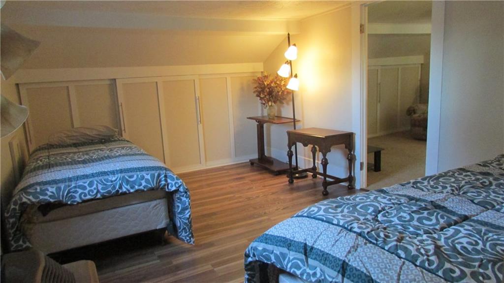 3110 Mercer Road New Castle, PA 16105 - Photo 17 of 25 2nd Bedroom on the second floor . Newer beautiful laminate floors. Many closets for storage.