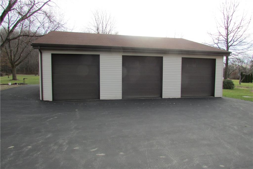 3110 Mercer Road New Castle, PA 16105 - Photo 4 of 25 Detached six car tandem garage. Another garage door in the back. Side lot good for RV parking