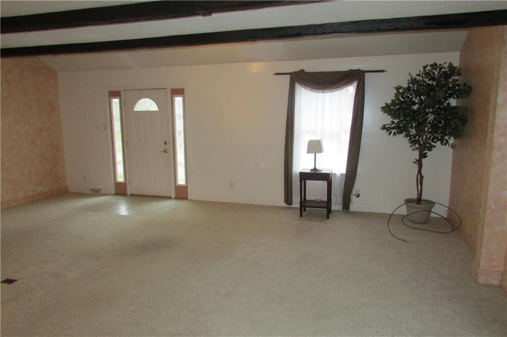 3110 Mercer Road New Castle, PA 16105 - Photo 6 of 25 Gorgeous living room with newer carpet newer thermal windows and room for a variety of furniture.