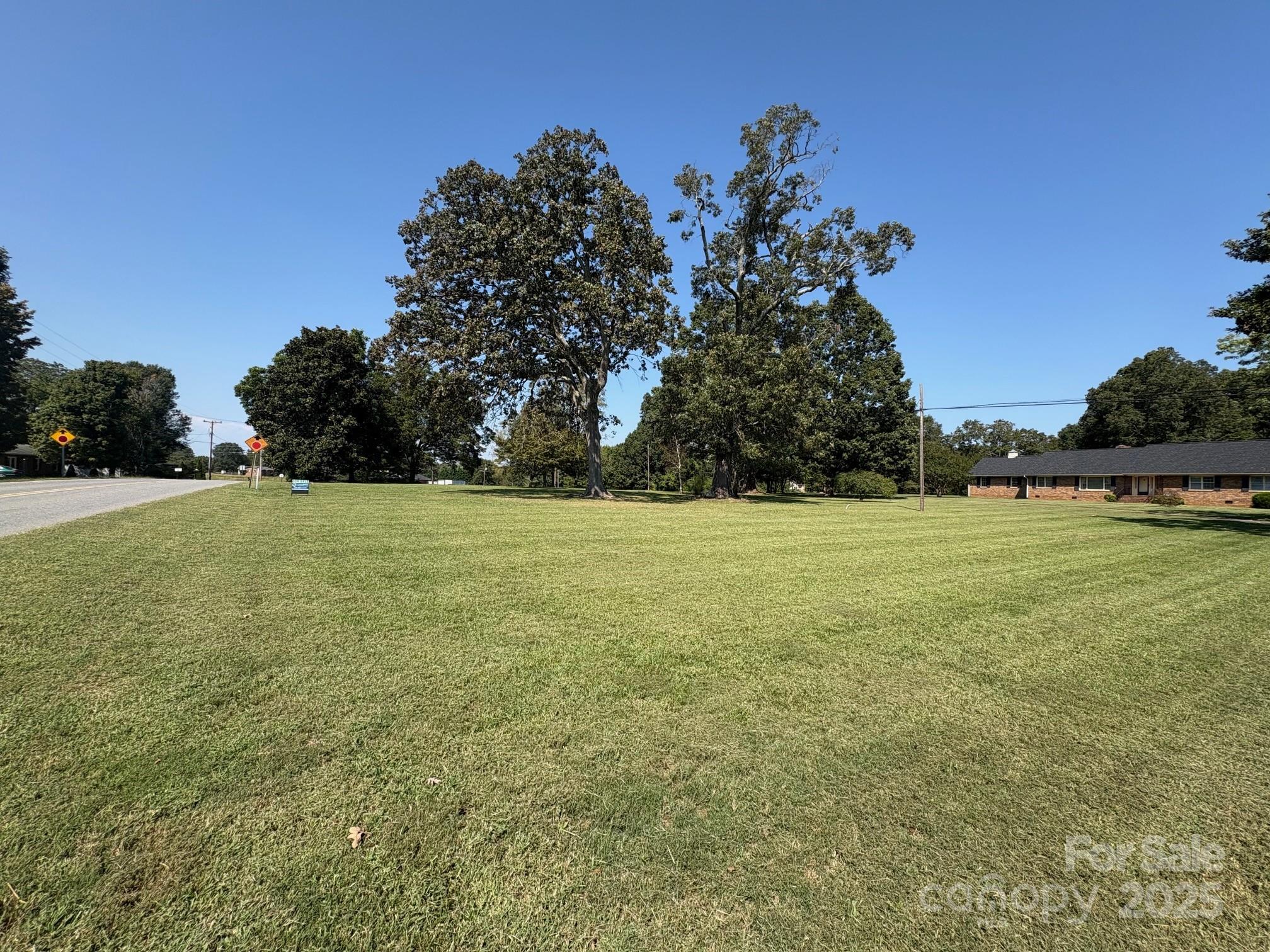 507 Poplar Springs Church Road Shelby, NC 28152 - Photo 13 of 47 a view of a field with an outdoor space