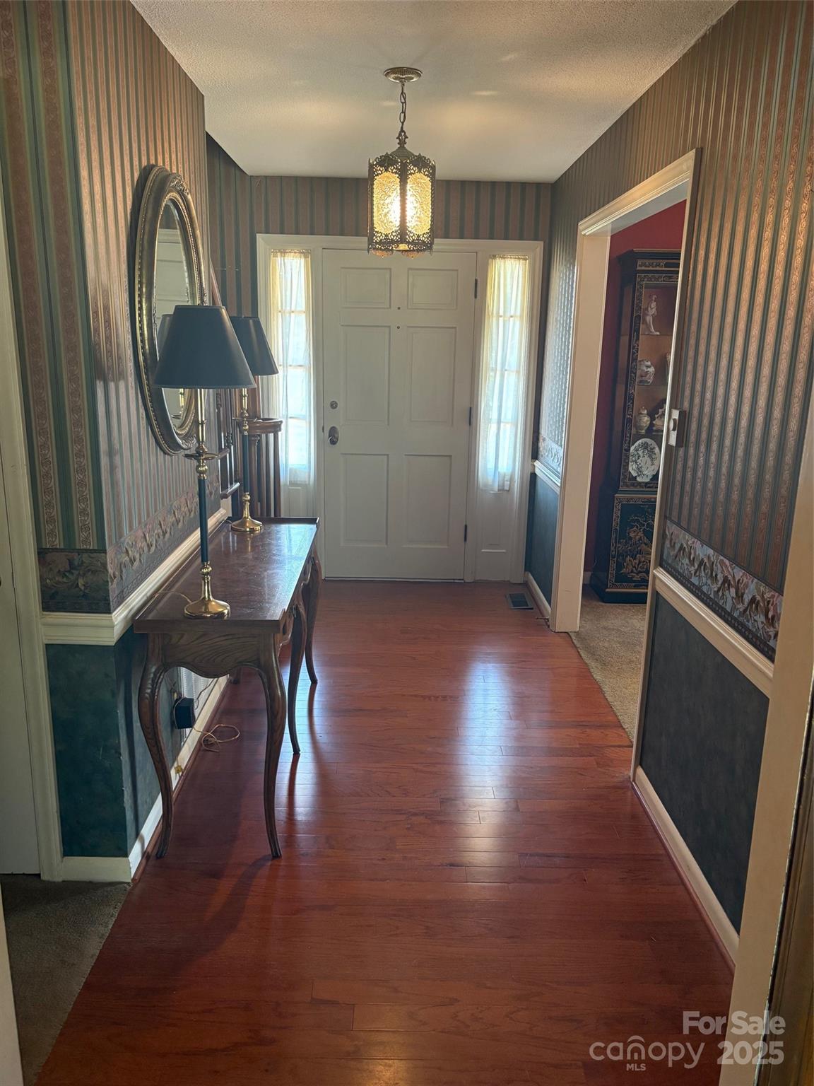 507 Poplar Springs Church Road Shelby, NC 28152 - Photo 34 of 47 a view of a livingroom with furniture wooden floor and window