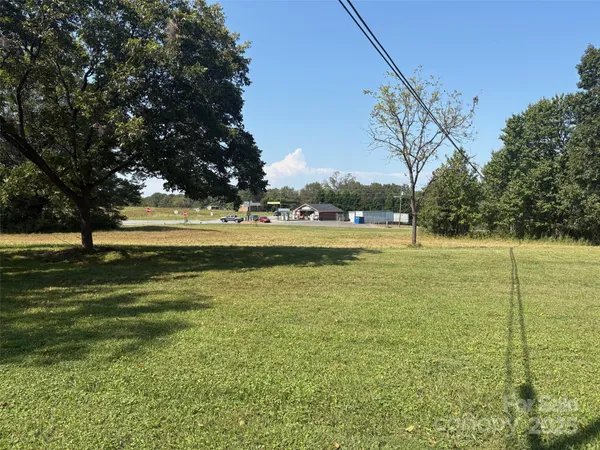 a view of a lake with a big yard