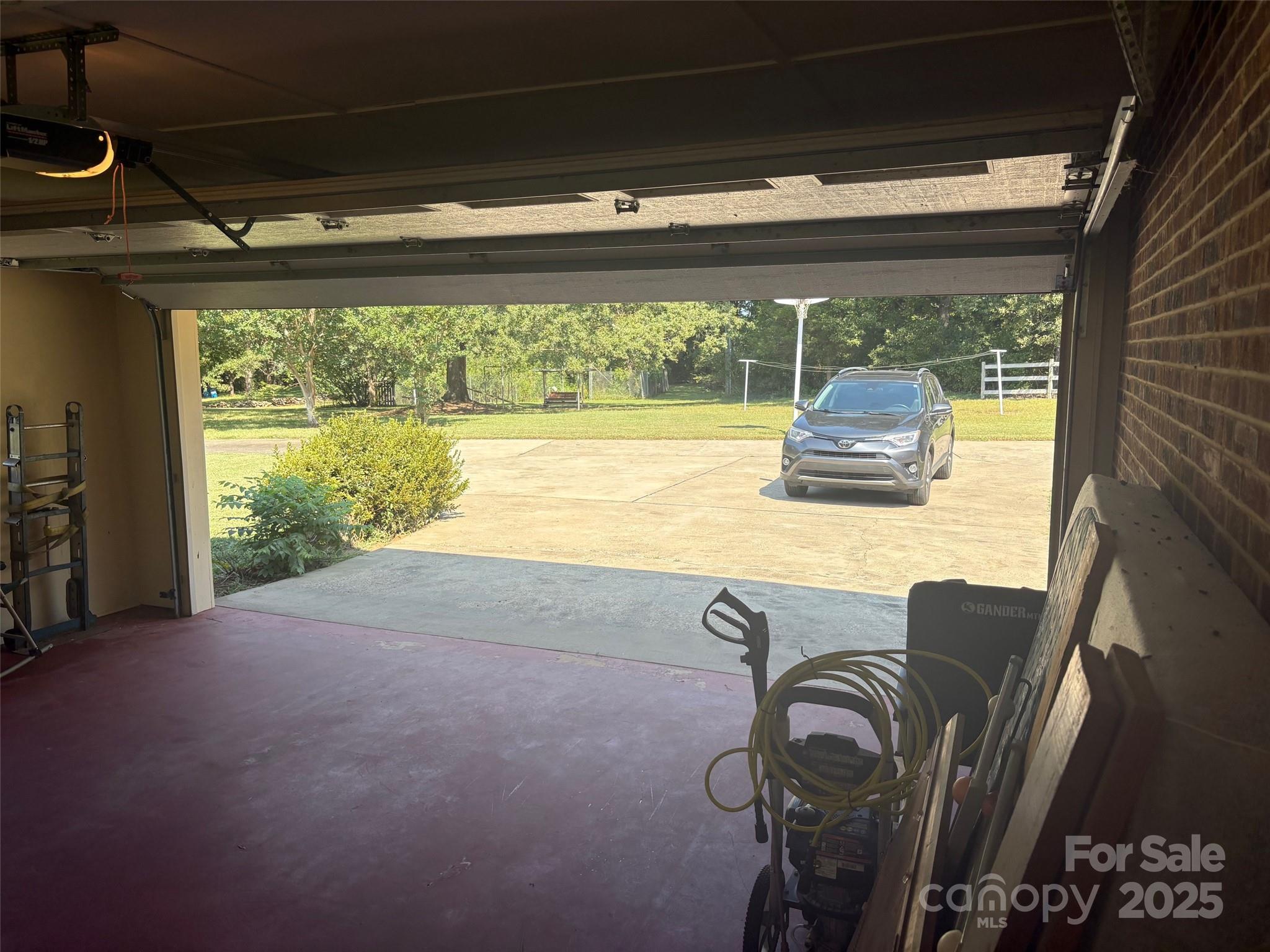 507 Poplar Springs Church Road Shelby, NC 28152 - Photo 43 of 47 a living room with furniture and a floor to ceiling window