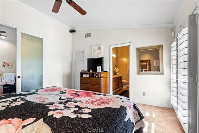 a living room with furniture gym equipment and a window