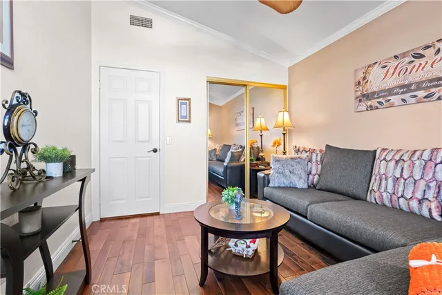 a bedroom with bed and a walk in closet