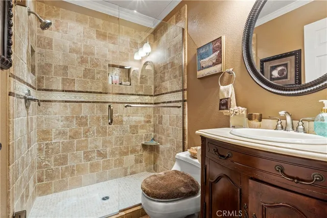 a view of a door and chair in wooden floor