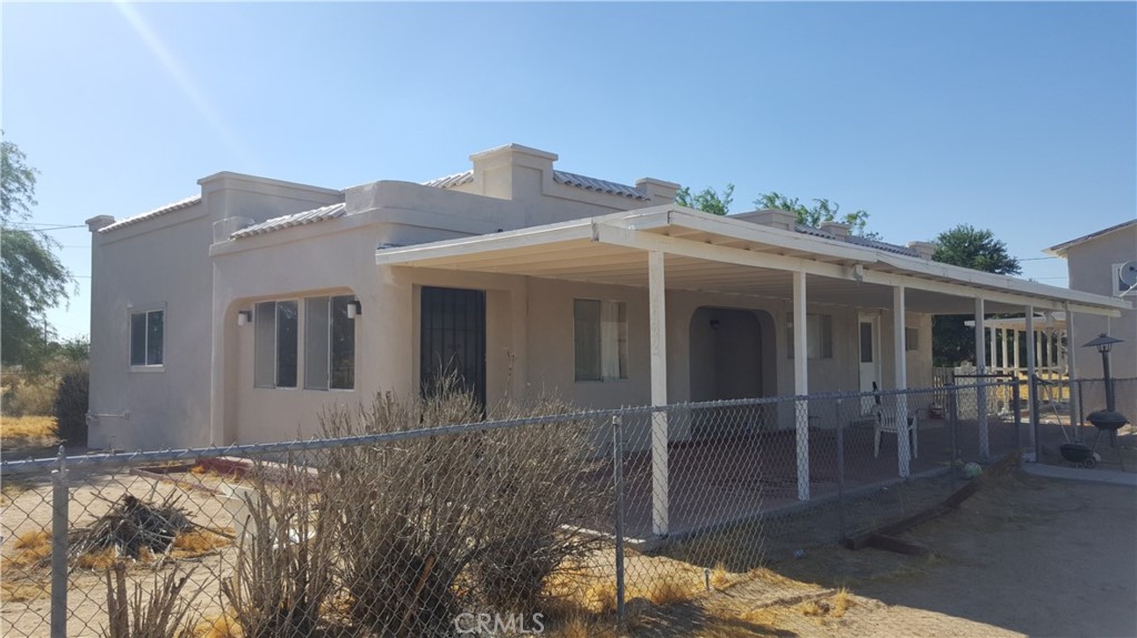 37632 Yermo Road Yermo, CA 92398 - Photo 1 of 1 a front view of a house with glass windows