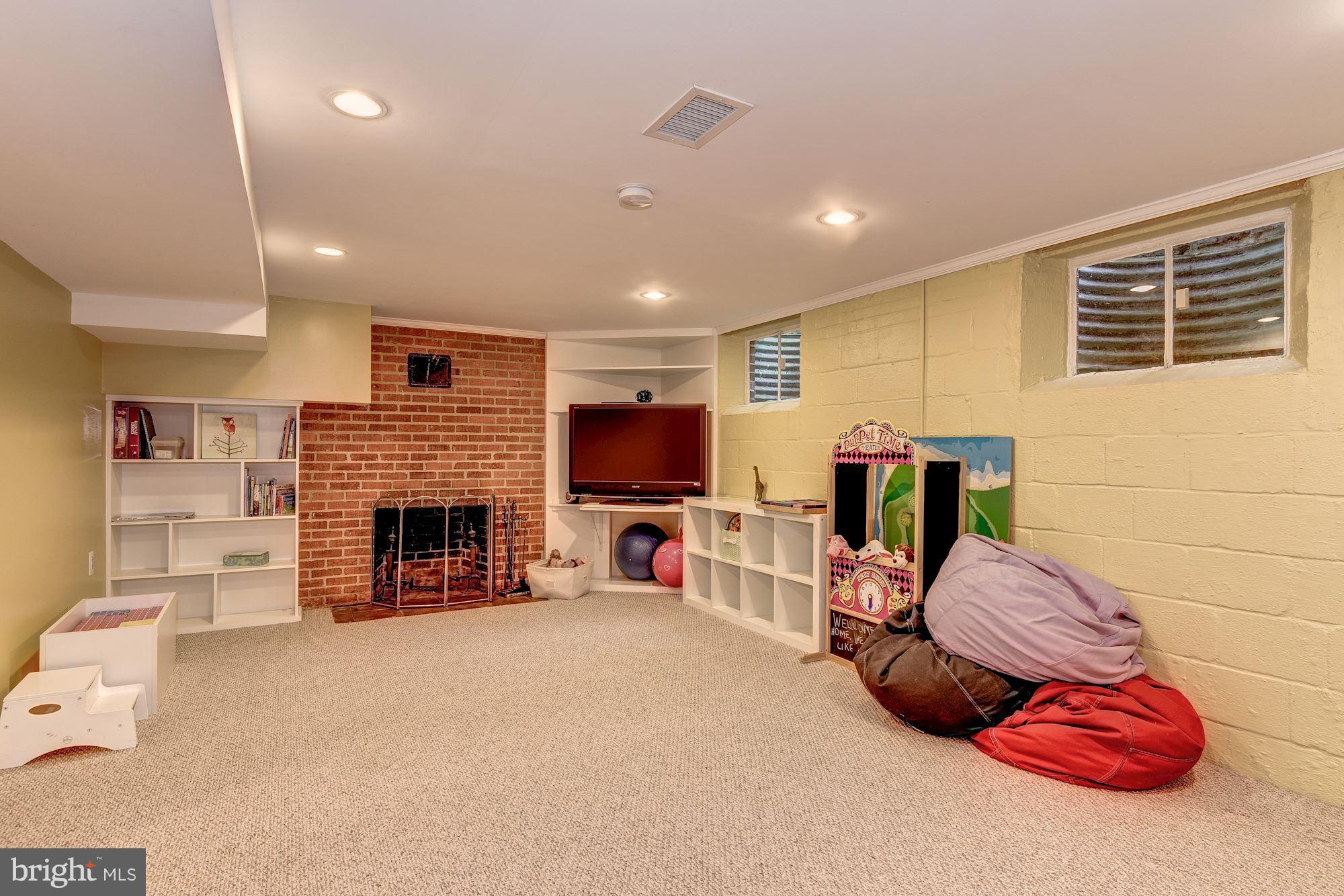 5704 Overlea Road Bethesda, MD 20816 - Photo 23 of 29 Recreation Room has a Fireplace