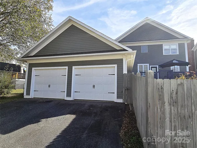 a front view of a house with a garage