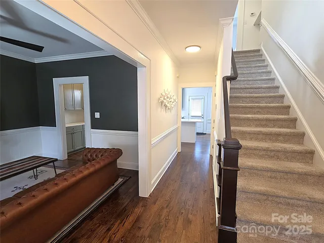 a view of a hallway with staircase
