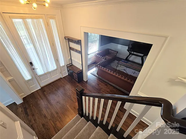 a view of stairs and with wooden floor