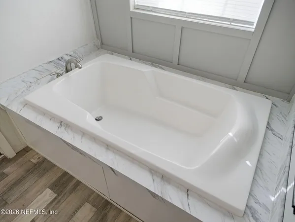 a bathroom with a bathtub