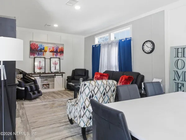 a bed room with a bed a couch and a closet