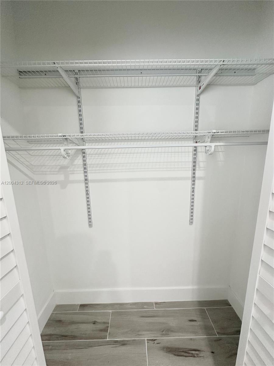 551 Southwest 57th Avenue, Unit 1 Miami, FL 33144 - Photo 15 of 24 a view of walk in closet
