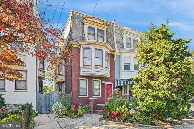 a front view of a multi story residential apartment building