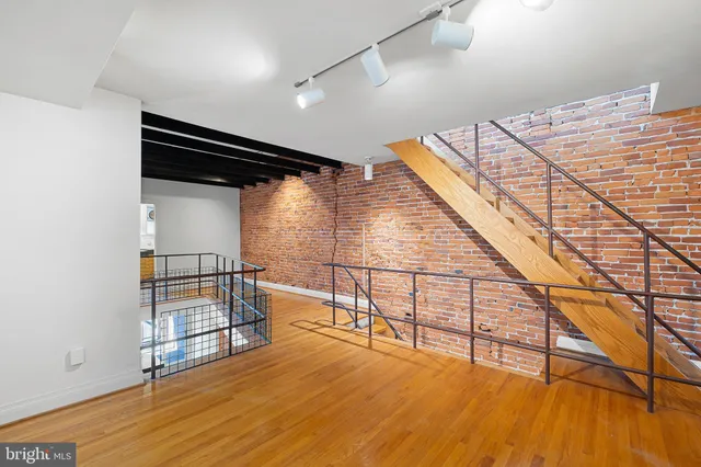 a view of entryway with wooden floor