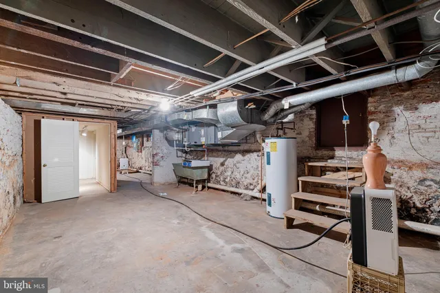a view of empty room with wooden ceiling