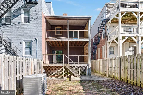 a front view of a house with a glass door
