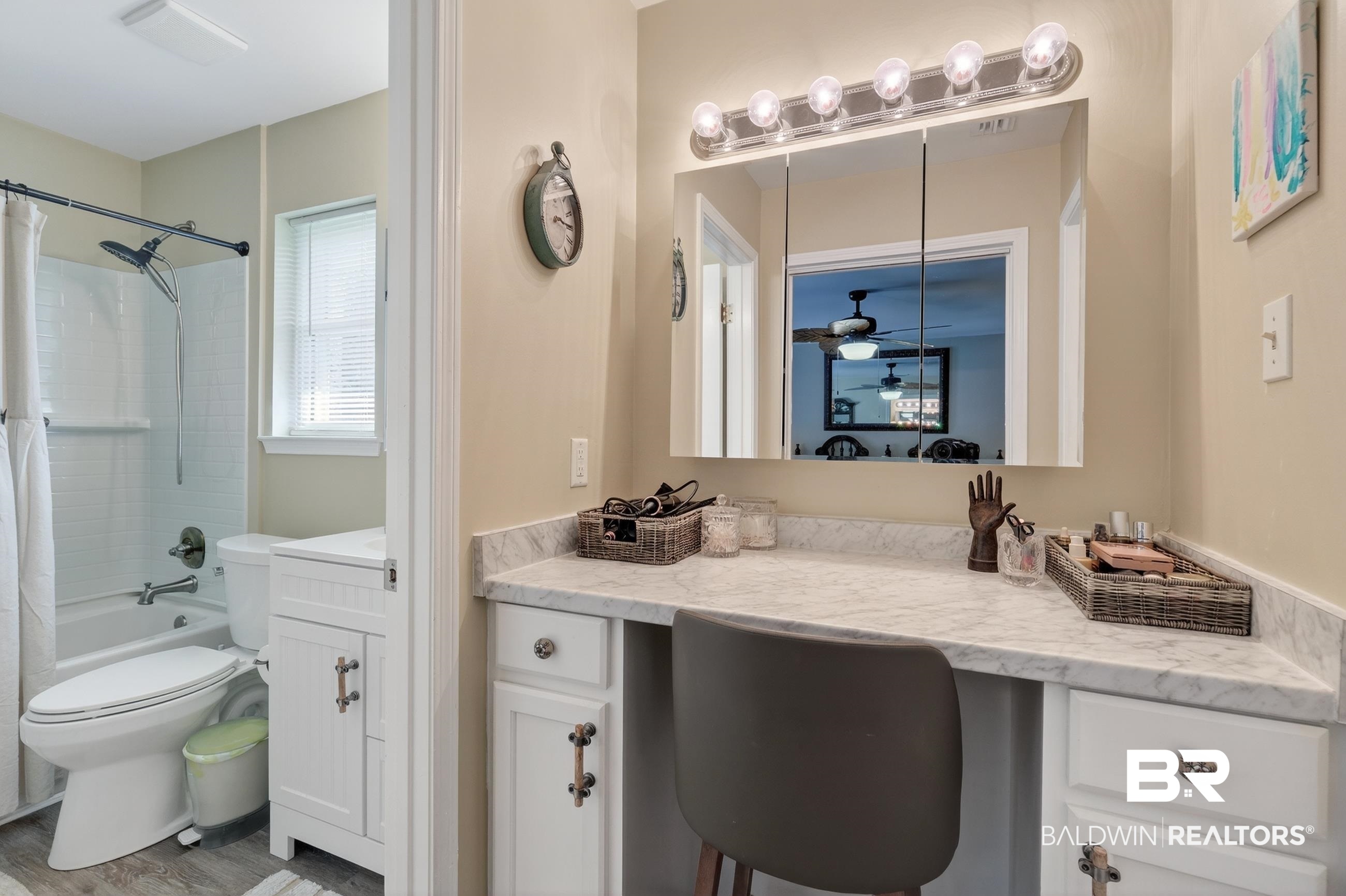 1271 Spring Valley Drive South Mobile, AL 36693 - Photo 35 of 56 Full bath featuring vanity, shower / tub combo with curtain, and wood finished floors