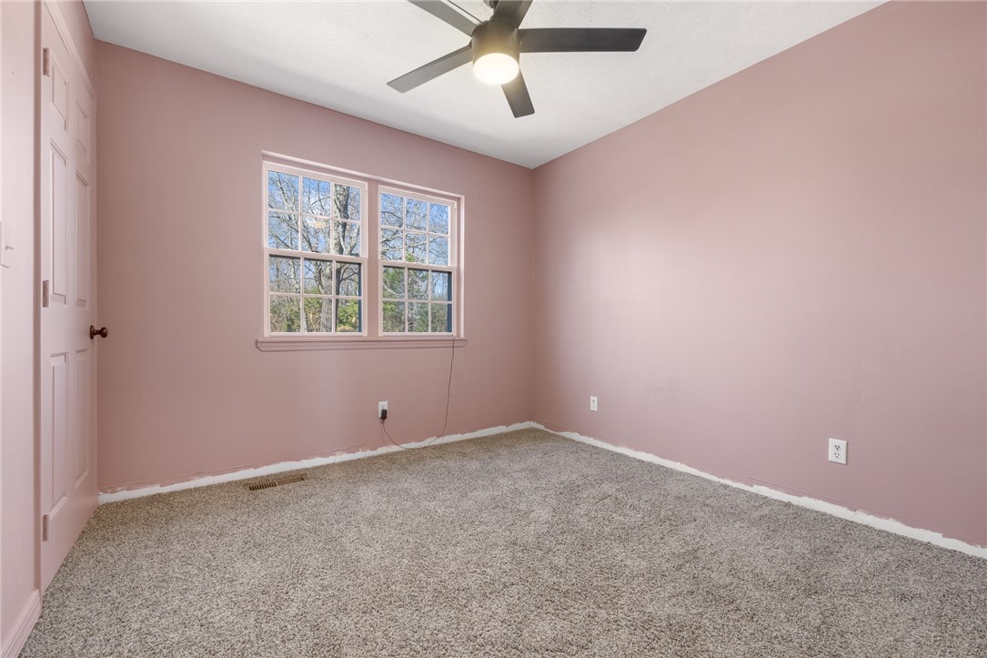 10974 Ricks Drive Harrison, AR 72601 - Photo 31 of 59 Empty room with carpet and a ceiling fan