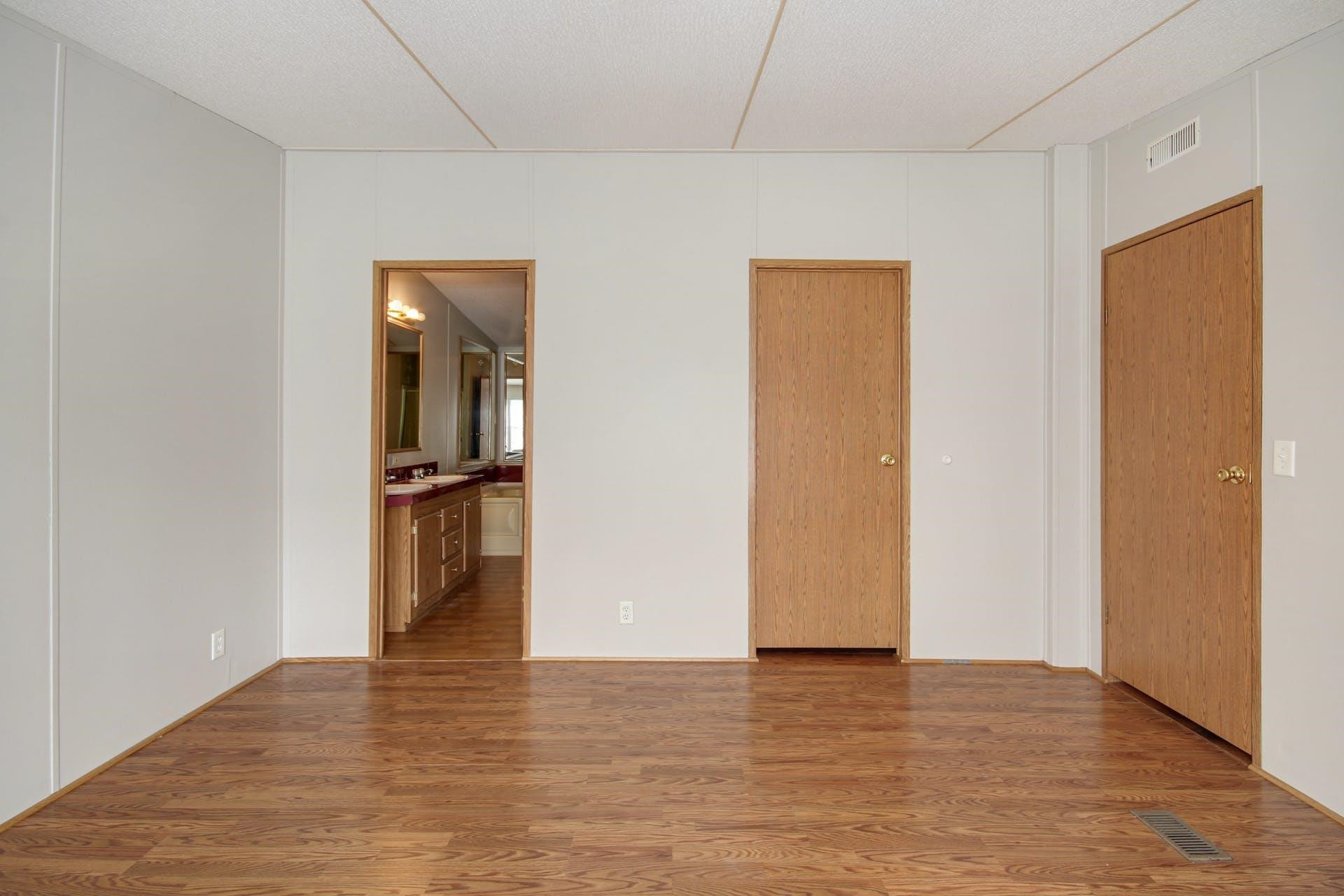 8144 Mt Pleasant Church Road Willow Spring, NC 27592 - Photo 15 of 25 a view of empty room with wooden floor