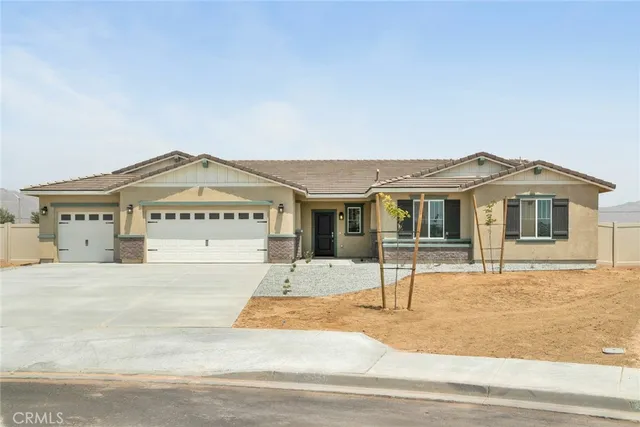 a view of a house with a street