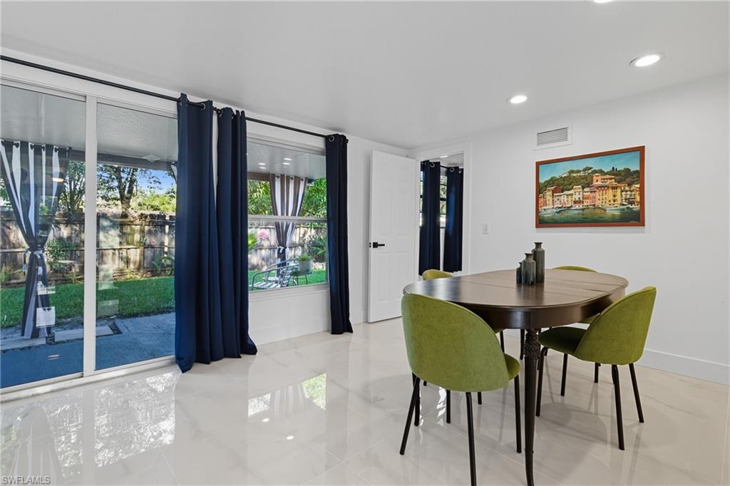 1280 Pine Street Naples, FL 34104 - Photo 26 of 36 a view of a dining room with furniture window and outside view