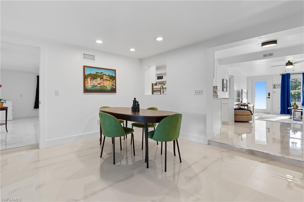 1280 Pine Street Naples, FL 34104 - Photo 27 of 36 a view of a dining room with furniture