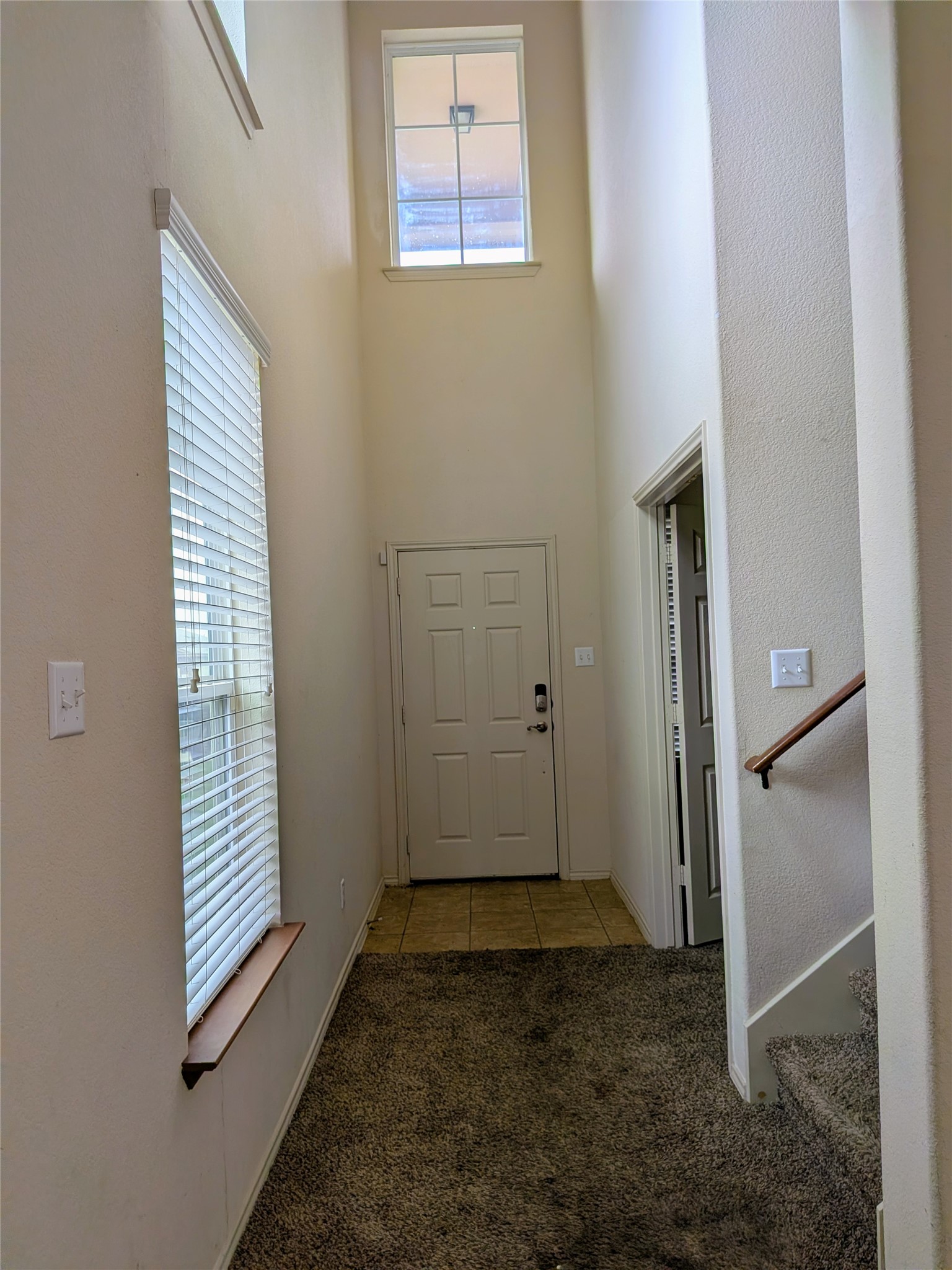 212 Foster Lane Jarrell, TX 76537 - Photo 2 of 22 Vaulted entry with high ceilings and transom window