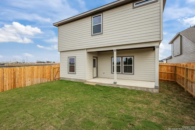 a view of a backyard with a garden