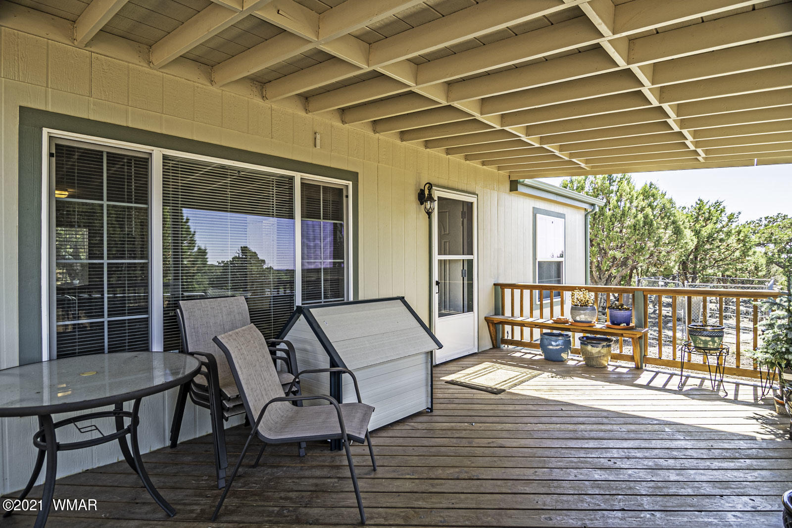 11 County Road Concho, AZ 85924 - Photo 29 of 35 a balcony with furniture and wooden floor