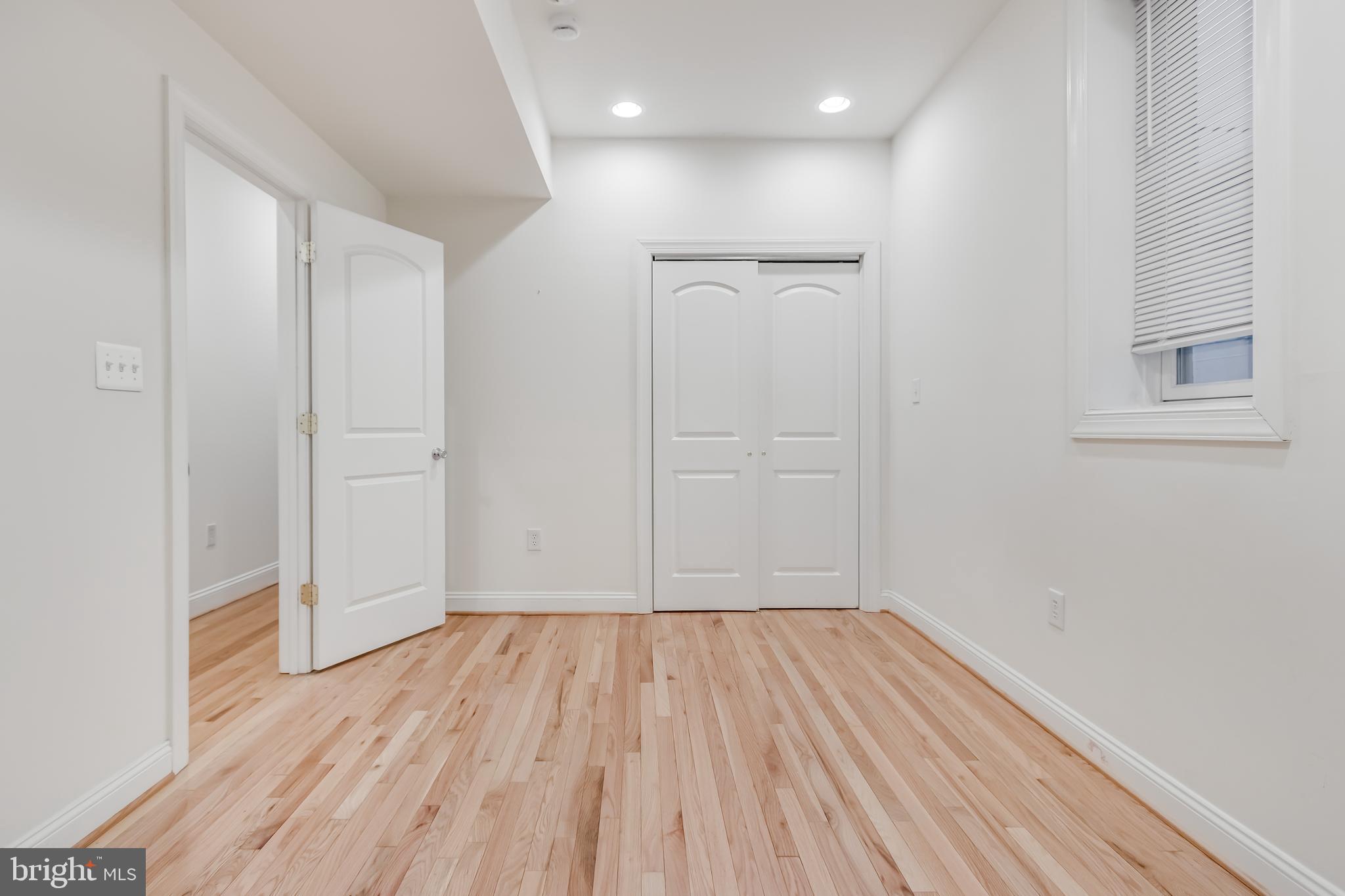 2307 18th Street Northwest, Unit 1 Washington, DC 20009 - Photo 18 of 21 a view of hallway with wooden floor