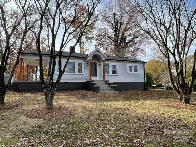 a front view of a house with entertaining space
