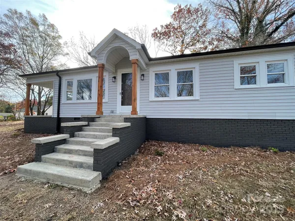 a front view of a house with entertaining space