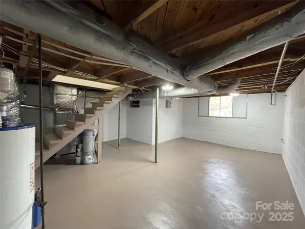 a view of an empty room with windows